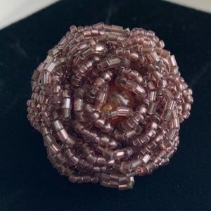 Hand-sewn purplish/brownish beaded ring